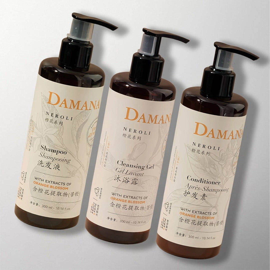 three bottles of DAMANA NEROLI toiletries.