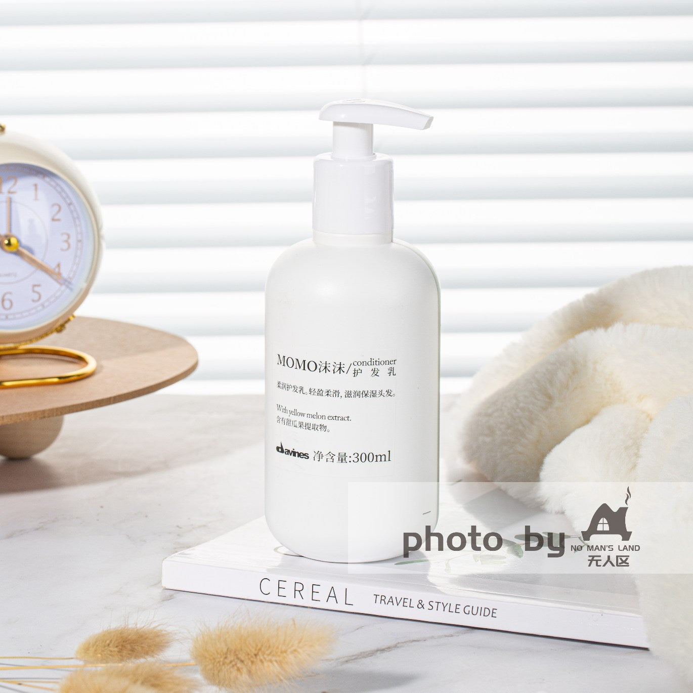 one bottle of DAVINES MOMO conditioner displayed.