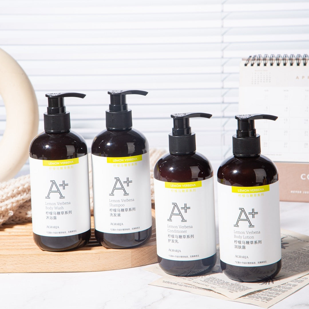 four bottles of AGRARIA hotel toiletries.
