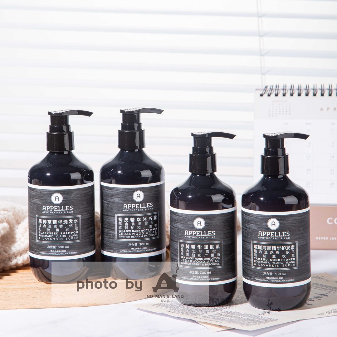 4 bottles of APPELLES Nigella Sativa toiletries displayed on the tray.