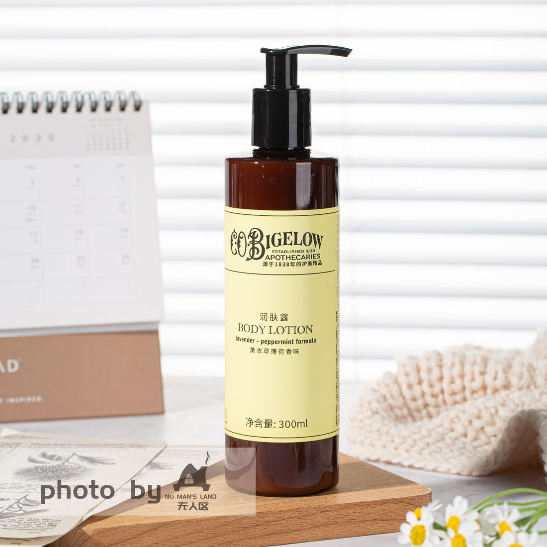 one bottle of C.O. BIGELOW body lotion displayed on the tray.