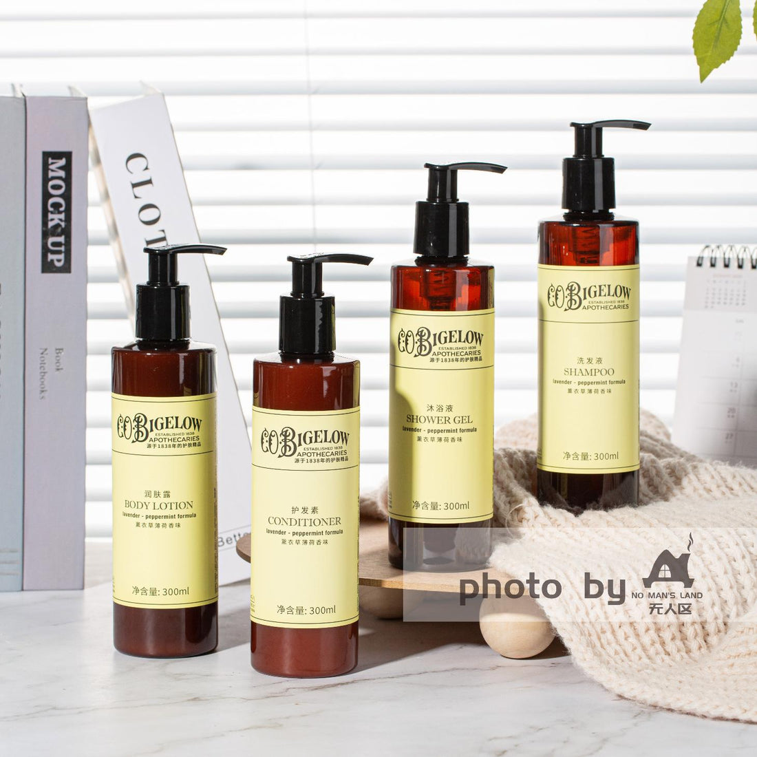 four bottles of C.O. BIGELOW hotel toiletries displayed.