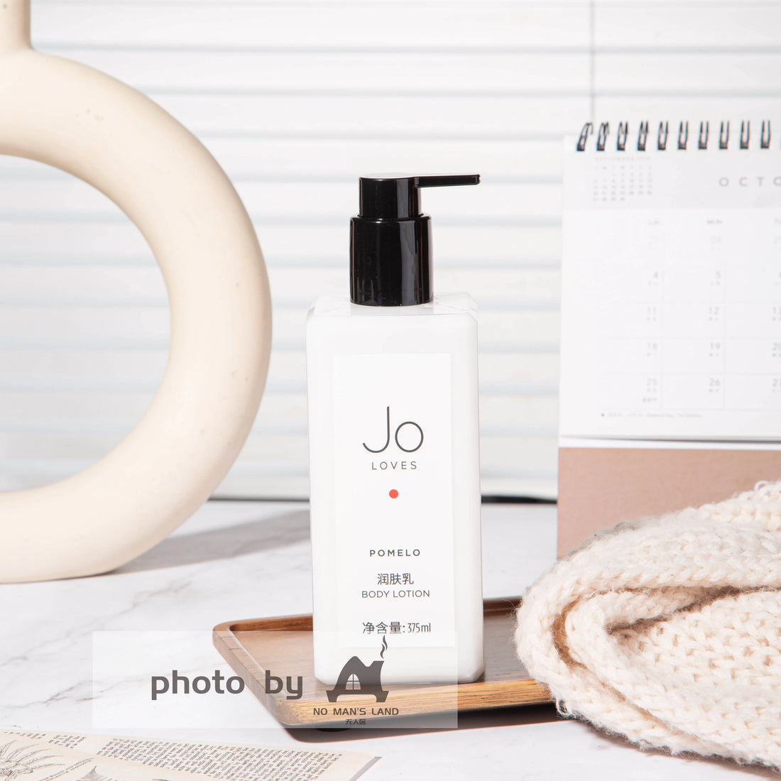 one bottle of JO-LOVES-POMELO-body-lotion.