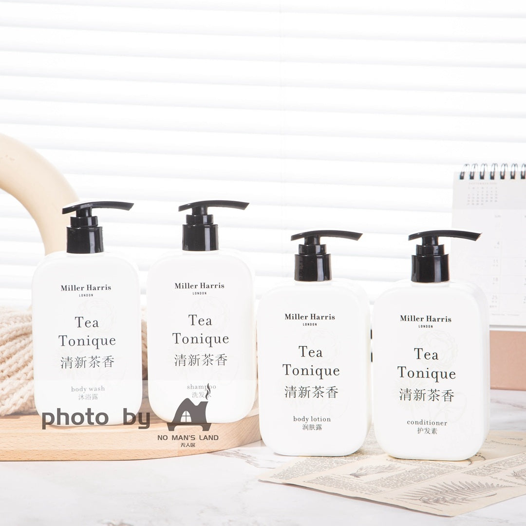 4 bottles of Miller Harris hotel toiletries displayed on the tray.